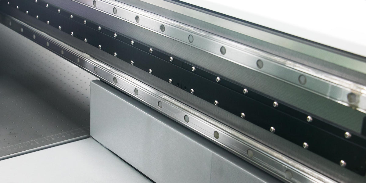 Compact UV flatbed printer producing short-run printed cartons and rigid packaging